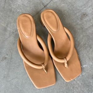 Worn once. Cushioned heel, soft leather slide